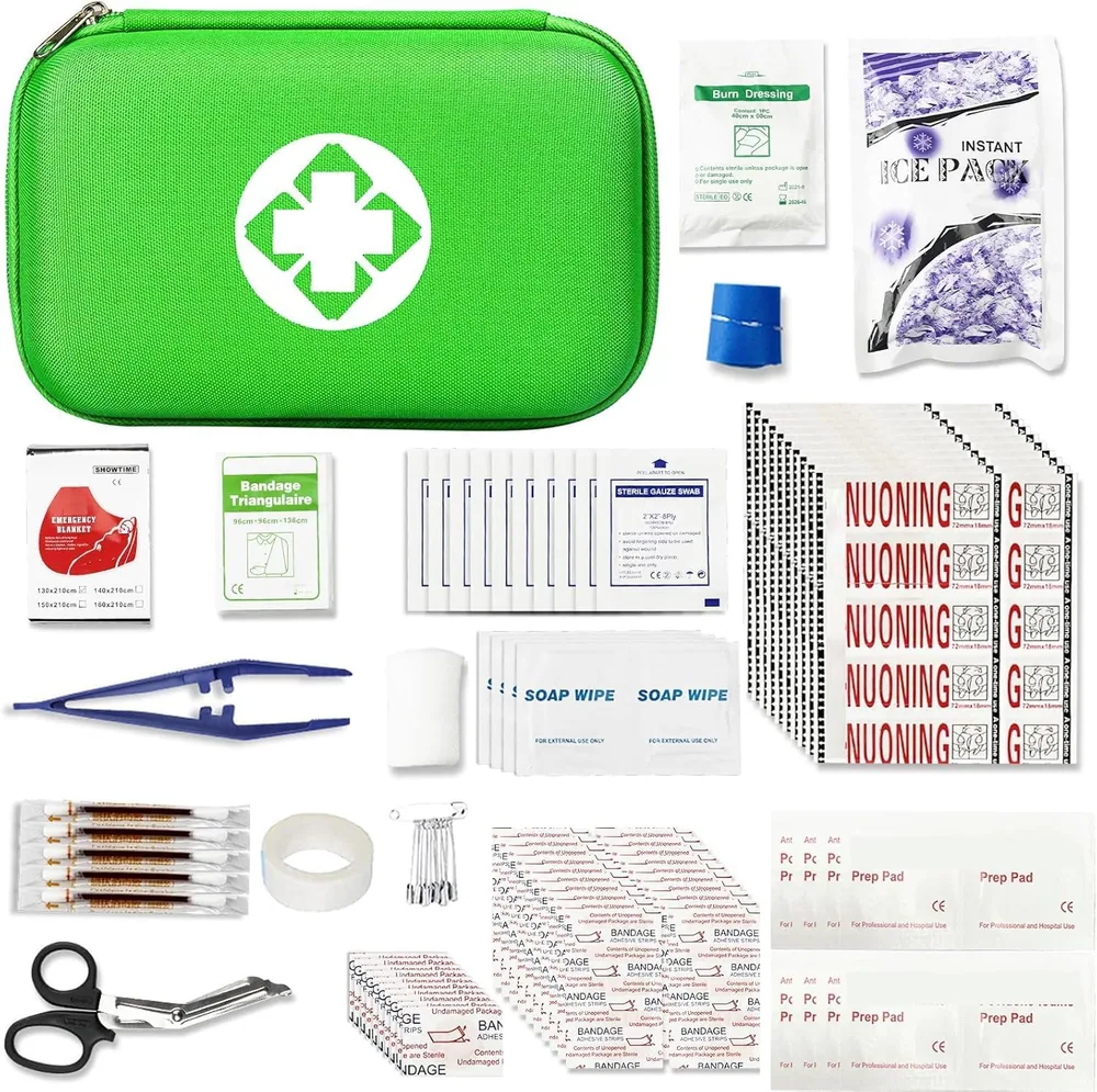 A green AMORNING first aid kit with its supplies laid out around it